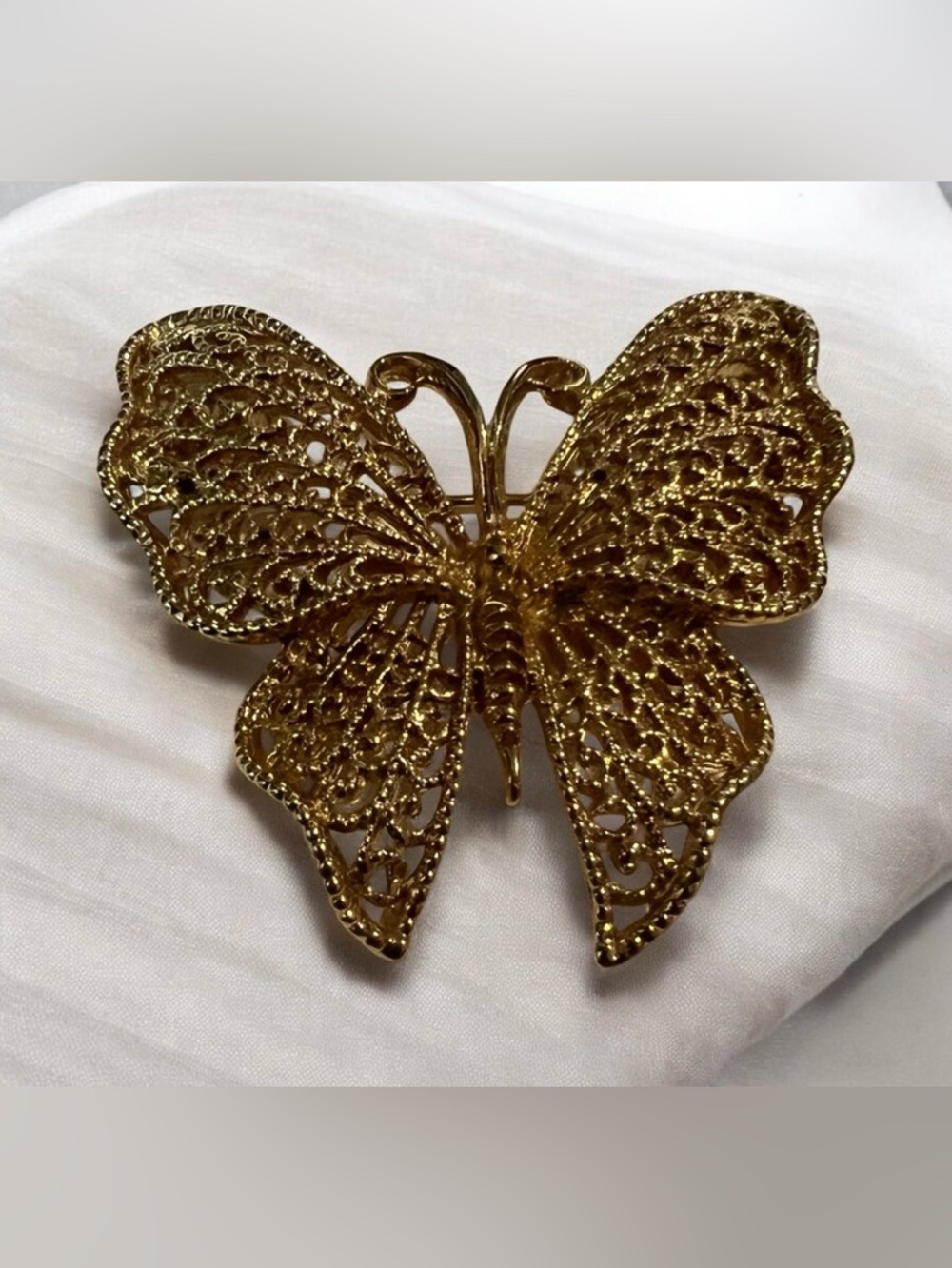 vintage 1960's gold-tone Napier filigree butterfly brooch.
